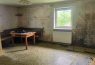 Renovierungsbedürftiges Einfamilienhaus in traumhafter Aussichtslage mit sonnigem Grundstück