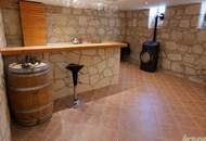 Einfamilienhaus mit Garten in Mörbisch am See – Naturstein-Weinkeller trifft Wellness
