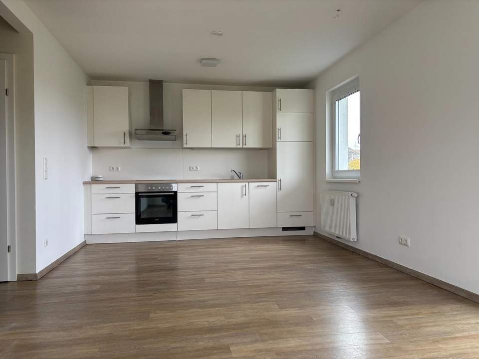 Erdgeschoßwohnung mit Gartenanteil in zentraler Lage