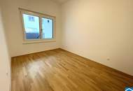 2-Zimmer-Wohntraum mit eigenem Garten und perfekter Anbindung