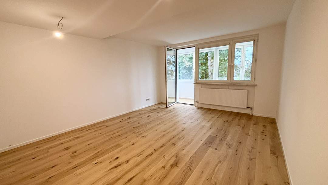 Sanierte Wohnung mit Schrebergarten