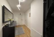 Zentrale 2-Zimmer-Eigentumswohnung mit Garten und Tiefgaragenplatz