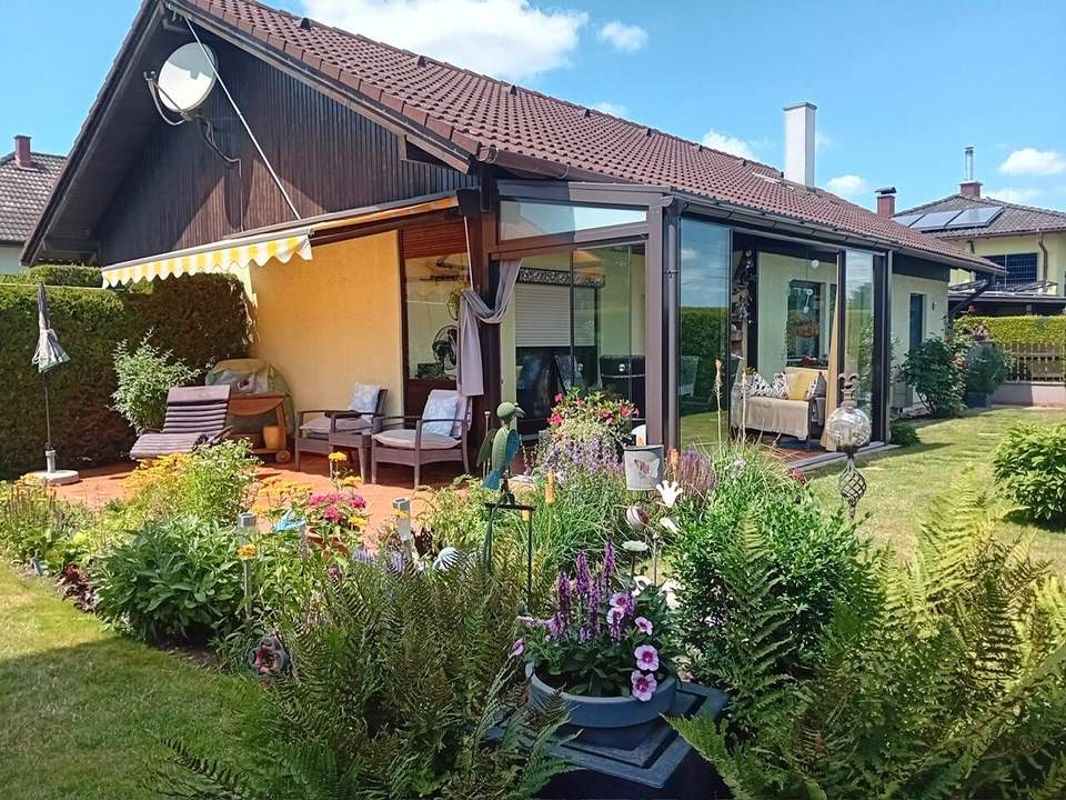 BUNGALOW mit Wintergarten und Garage!