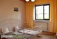 Ebenerdiges Wohnhaus inklusive Einliegerwohnung und romantischem Bauerngarten!