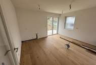 Modernes Zweifamilienhaus mit Gartenwohnungen – Erstbezug!