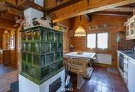 „Wohnen im Einklang mit der Natur – Stilvolles Holzhaus in traumhafter Ruhelage auf unverbaubarem Grundstück“