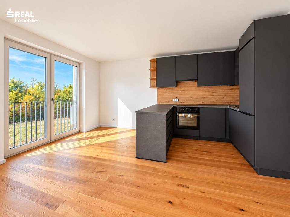 Erstbezug: 2 Zimmer mit Garten, moderner Küche und Carport