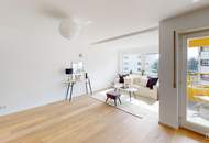 Moderne Dachgeschoss-Maisonette in Wien-Mauer mit zwei Balkonen, Garage und Liftzugang auf beiden Ebenen | ZELLMANN IMMOBILIEN