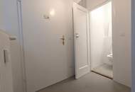 Ruhiges, zentrales Portallokal mit Gassenzugang – ideal für Coaching, Studio, Abholpunkt
