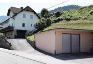 Gemütliches Ein-/Zweifamilienhaus mit 9 Zimmern und Garage auf 805 m² Hanggrund