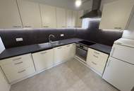 Frisch renovierte 2-Zimmer-Wohnung mit zwei Sonnenterrassen &amp; eigener Garage