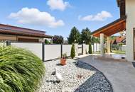High-end living in a peaceful green location! A feel-good retreat in a class of its own: tradition meets state-of-the-art comfort!