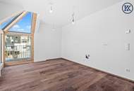 Luftiges Dachgeschoss-Refugium: Atemberaubende 2-Zimmer-Wohnung mit beeindruckender Freifläche