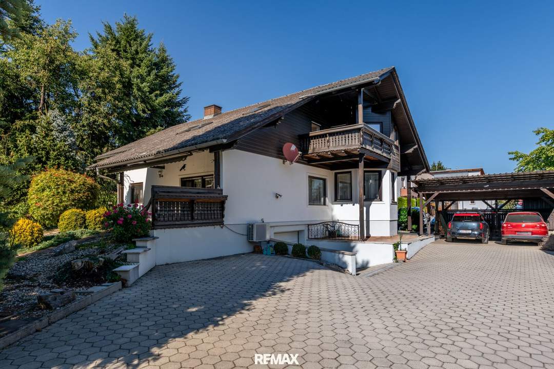 Großzügiges Haus mit sonnigem Garten, Carport, Garage und Fußbodenheizung!