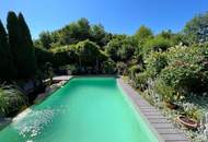 Charmantes Zweifamilienhaus mit idyllischem Naturpool
