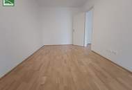 Gartenwohnung mitten in der Stadt! Karmeliterhof - Neubauwohntraum beim Rathausplatz