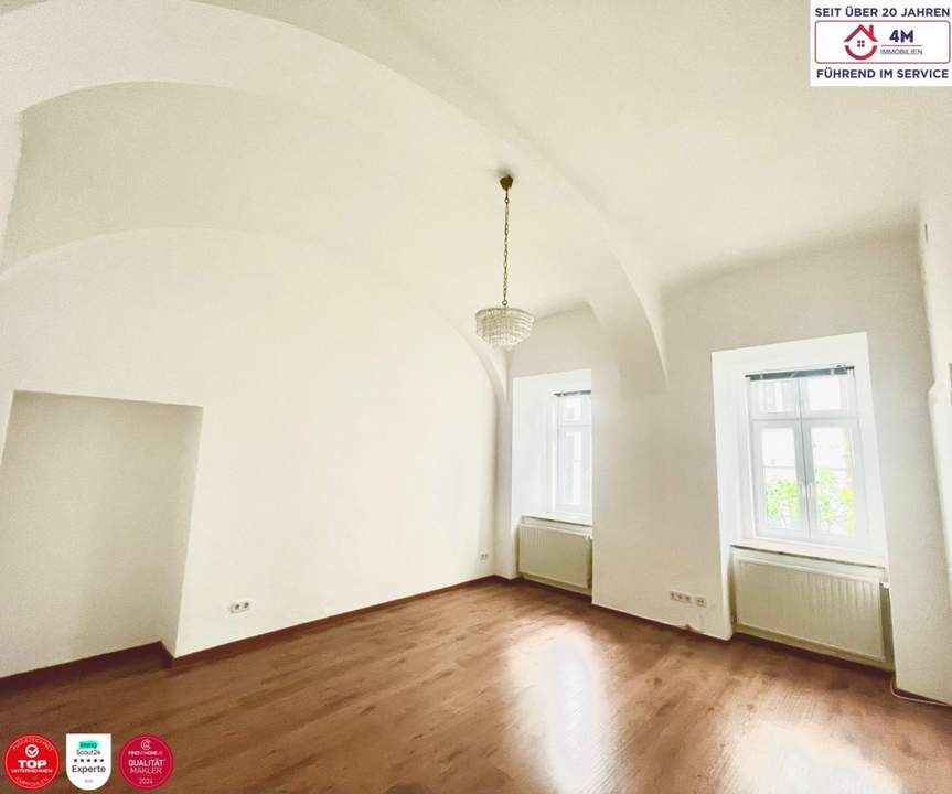 Ruhige Altbauperle mit Flair – im begrünten Innenhof des 4. Bezirks
