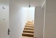 Eleganz trifft Lage – Neubau-Dachgeschosswohnung in Toplage