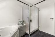 Wohnen über den Dächern von Graz mit Blick auf den Schlossberg: Exklusive Stadtwohnung mit Terrasse