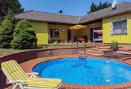 Licht, Luft und Freiheit: Bungalow mit großem 1.622 m2 Garten und Pool