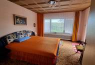 Vielseitiges Mehrfamilienhaus mit Charme und einladendem Garten