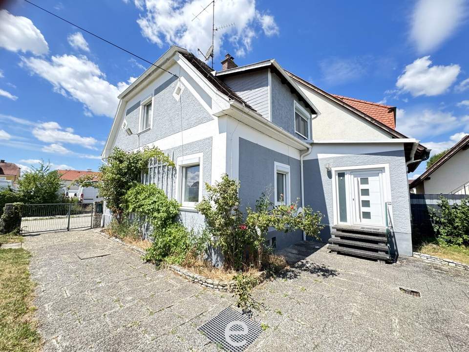 Heimeliges Eigenheim mit sonnigem Familiengarten in ruhiger Siedlungslage