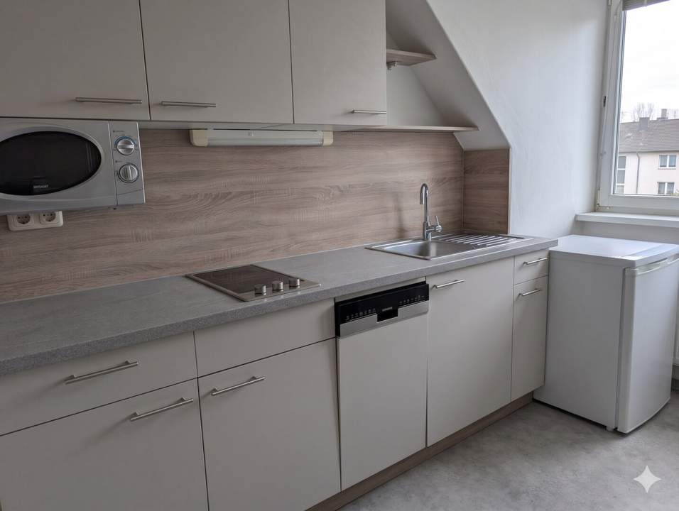 Vermietete, zentrale Dachgeschoßwohnung