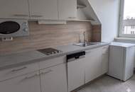 Vermietete, zentrale Dachgeschoßwohnung