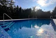 Exklusive Luxusvilla mit Pool und traumhaftem Garten in begehrter Lage von Bruckhaufen nahe Alte Donau und UNO City.