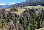 Sonniges Baugrundstück mit zusätzlicher Grünfläche am Waldrand – Aussichtslage in Arzl!
