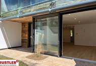 Eleganz im Grünen – Hochwertige Gartenwohnung mit Ost-West-Ausrichtung