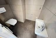 Helle 3-Zimmer Neubau Maisonette-Wohnung mit 2 Terassen, Wohnküche, Gartennutzung, Kellerabteil und Garagenplatz optional