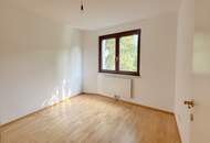 Stadtleben im Grünen – Stilvolle Wohnung mit Terrasse und Garten