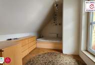 Helle Dachgeschoss-Maisonette mit zwei traumhaften Terrassen und Tiefgaragenplatz