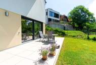 Design trifft Natur: stylische Garten-Maisonettewohnung mit traumhafter Aussicht