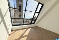 Spektakuläre Dachgeschoßmaisonette mit Terrassentraum und Blick auf die Canisiuskirche