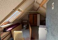 Stadthaus mit Geschäftsräumen, Wohneinheit, Garage und Stellplätzen – für Eigennutzer und Anleger