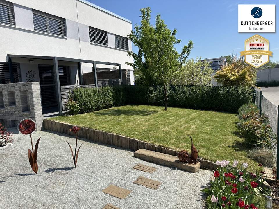 MODERNES PASSIV-DOPPELHAUS MIT SCHÖNEM GARTEN