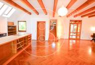 Einfamilienhaus in zentraler Bestlage mit Tennisplatz auf parkähnlichem Grund!