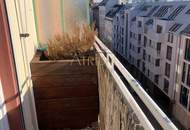Lichtdurchflutete 2-Zimmer-Dachgeschosswohnung mit 40 m² Terrasse in ruhiger Lage