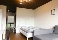 Charmante Dachgeschosswohnung mit Panoramablick - inklusive Loggia und Carport!