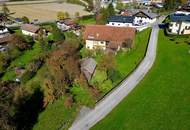Baugrundstück mit sanierungsbedürftigem Bauernhof in schönster Lage