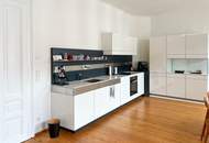 Helle Altbauwohnung mit Balkon und Wohnküche in bester Lage