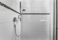 Wohngenuss im Dachgeschoss – Seeblick, Wellnessoase & alpiner Charme vereint