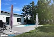 Luxuriöses Wohnen mit Einliegerwohnung, Pool und beeindruckendem Naturflair