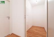 Hochwertige Erstbezugs-Wohnung mit großem Hof-Balkon und Küche nahe Schönbrunn!