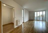 Linz-Oed: Dank vieler großer Fenster lichtdurchflutete 3-Zimmer-Wohnung mit Balkon & Autoabstellplatz in städtischer ruhiger Grünlage