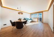 Sanierte Perle mit alpinem Flair: Exklusive 2-Zimmer-Wohnung