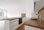 ERSTBEZUG nach Sanierung mit Blick auf Schloss Laudon | ca. 16 m² Loggia | Garagenplatz | Vollausgestattete Küche | Erholungsgebiet angrenzend