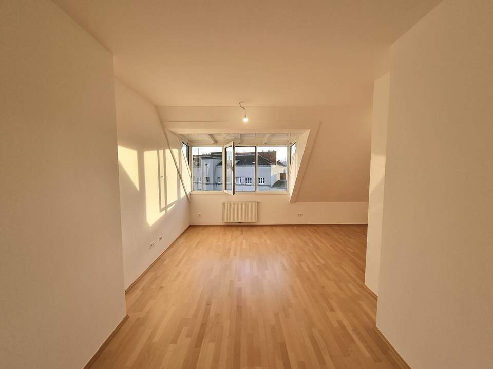 Nähe U1 | Klimatisierte Dachgeschosswohnung mit tollem Wienblick | Tiefgarage